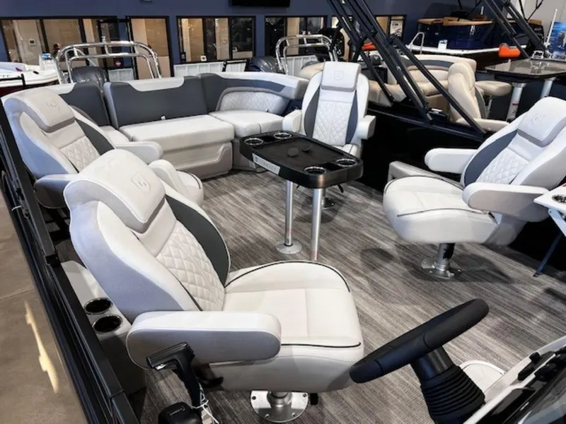 Slide: The Image of Luxurious interior of 2025 Godfrey Sweetwater 2286 QS pontoon boat with plush seating. - 40
