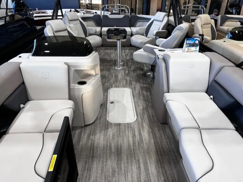 Slide: The Image of 2025 Godfrey Sweetwater 2286 QS pontoon boat interior with luxurious seating and modern design. - 41