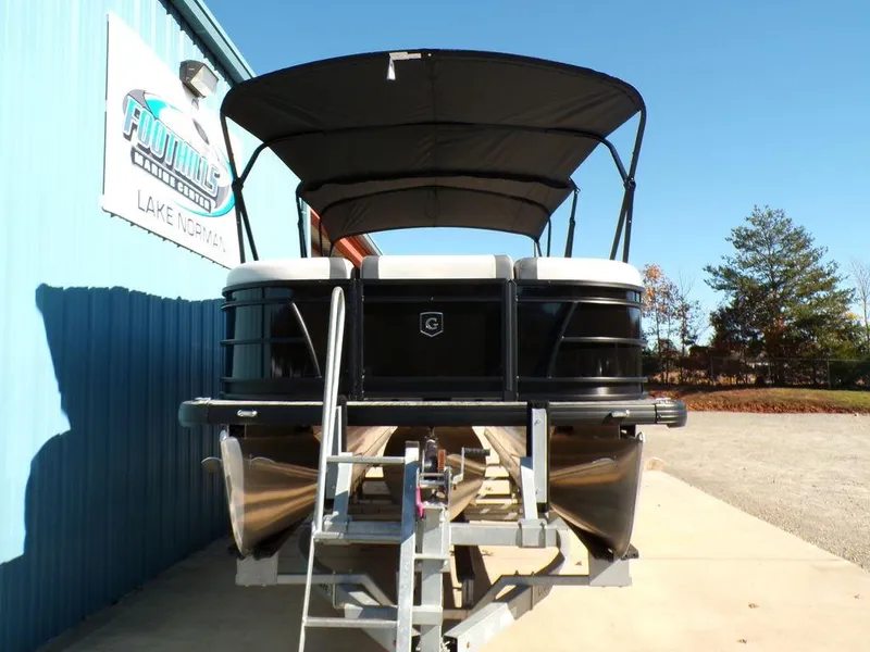 Slide: The Image of 2025 Godfrey Sweetwater 2286 QS pontoon boat on display at dealership. - 5