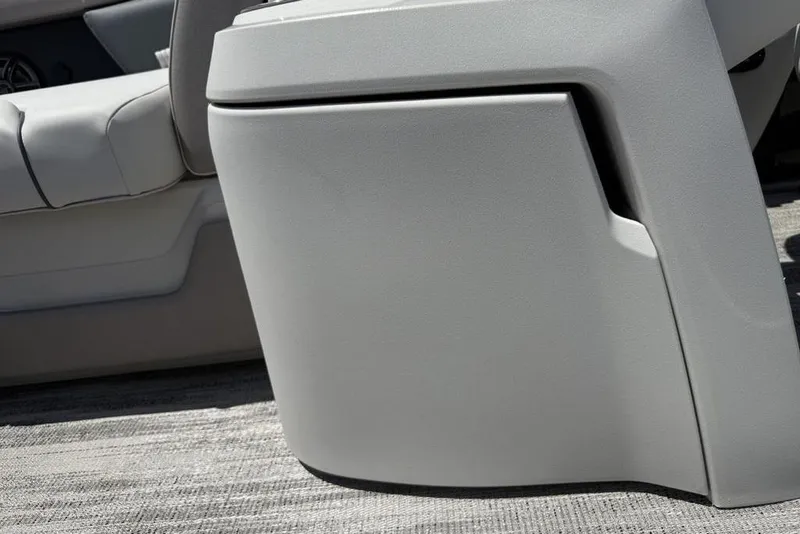 Slide: The Image of Close-up of 2025 Godfrey Sweetwater 2286 QS boat interior, featuring sleek gray seating and console. - 51
