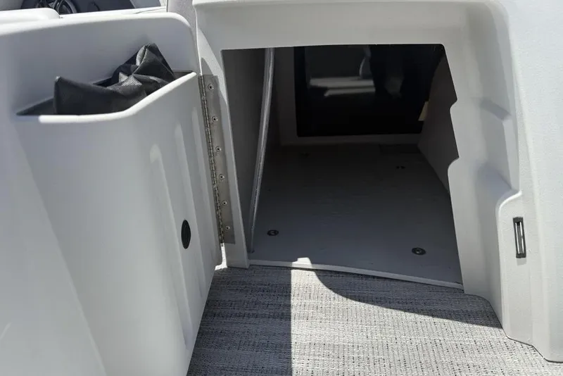 Slide: The Image of Interior storage compartment of 2025 Godfrey Sweetwater 2286 QS pontoon boat. - 52