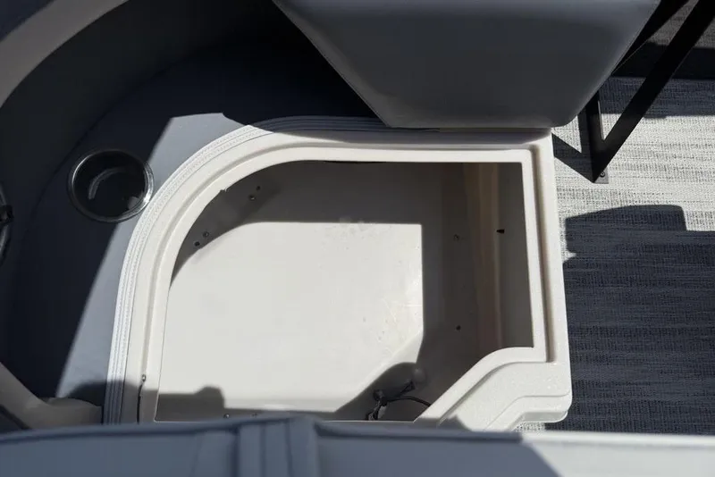 Slide: The Image of Storage compartment on 2025 Godfrey Sweetwater 2286 QS pontoon boat, featuring modern design. - 56