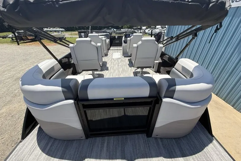 Slide: The Image of 2025 Godfrey Sweetwater 2286 QS pontoon boat interior with plush seating and canopy. - 57