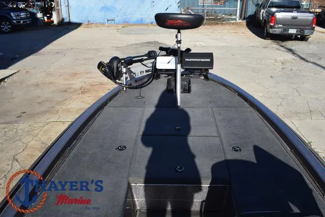 Slide: The Image of 1997 Skeeter ZX202C boat deck with Minn Kota trolling motor and Humminbird fish finder. - 10