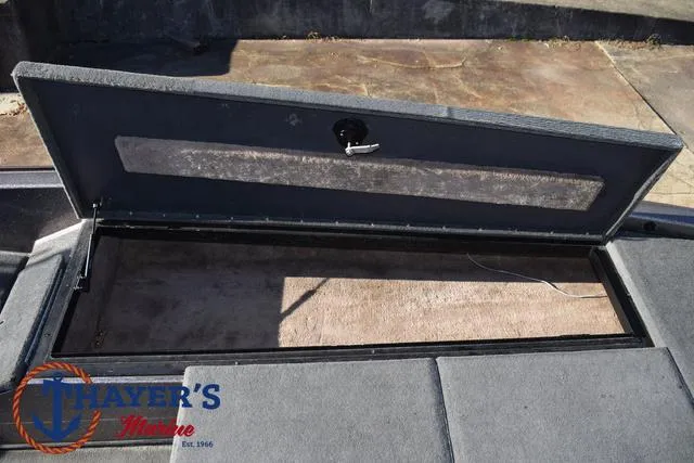Slide: The Image of Open storage compartment on 1997 Skeeter ZX202C boat deck. - 11