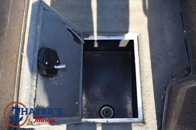 Slide: The Image of Open storage compartment on 1997 Skeeter ZX202C boat deck. - 20