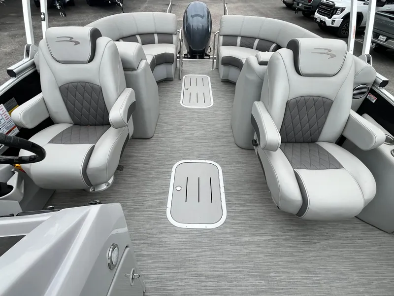 Slide: The Image of 2022 Bennington 23LTFB pontoon boat interior with luxurious gray seating and spacious layout. - 17