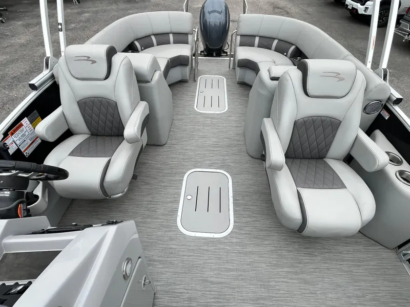 Slide: The Image of 2022 Bennington 23LTFB pontoon boat interior with luxurious gray seating and modern design. - 18