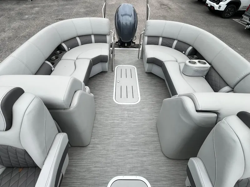 Slide: The Image of 2022 Bennington 23LTFB pontoon boat with spacious gray seating and modern design. - 8
