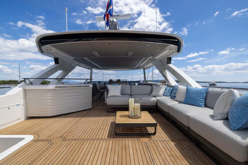 Slide: The Image of Luxurious 2024 Absolute NAVETTA 75 yacht deck with elegant seating and ocean view. - 36