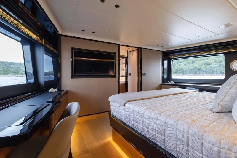 Slide: The Image of Luxurious bedroom interior of 2024 Absolute NAVETTA 75 yacht with scenic window views. - 49