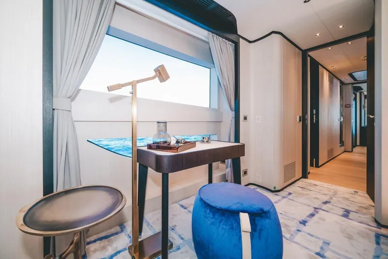 Slide: The Image of Luxurious interior of 2020 Benetti Delfino 95 yacht with modern furnishings and large window. - 37
