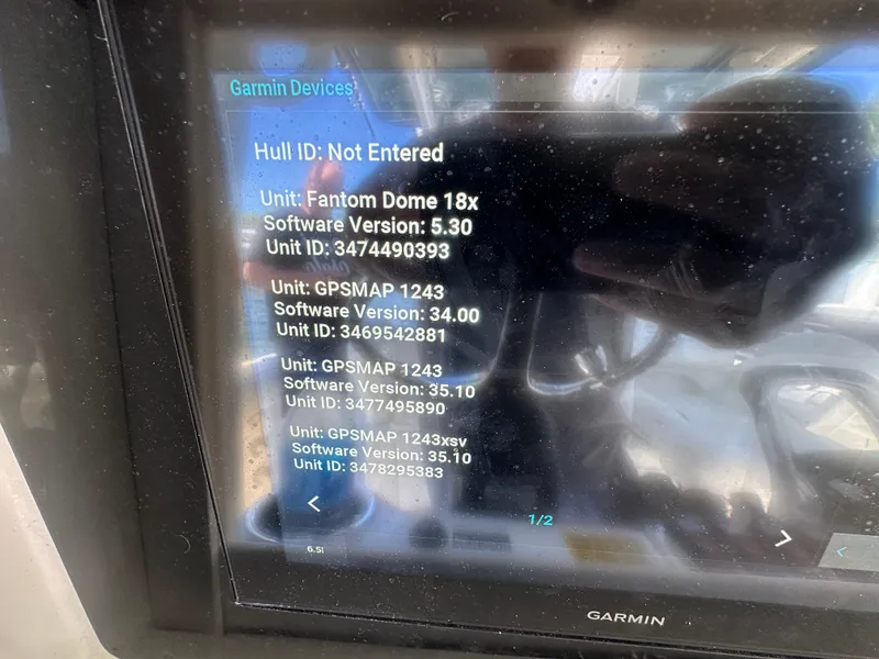 Slide: The Image of Garmin device display showing software versions and unit IDs on Everglades 350 CC, 2008 model. - 13