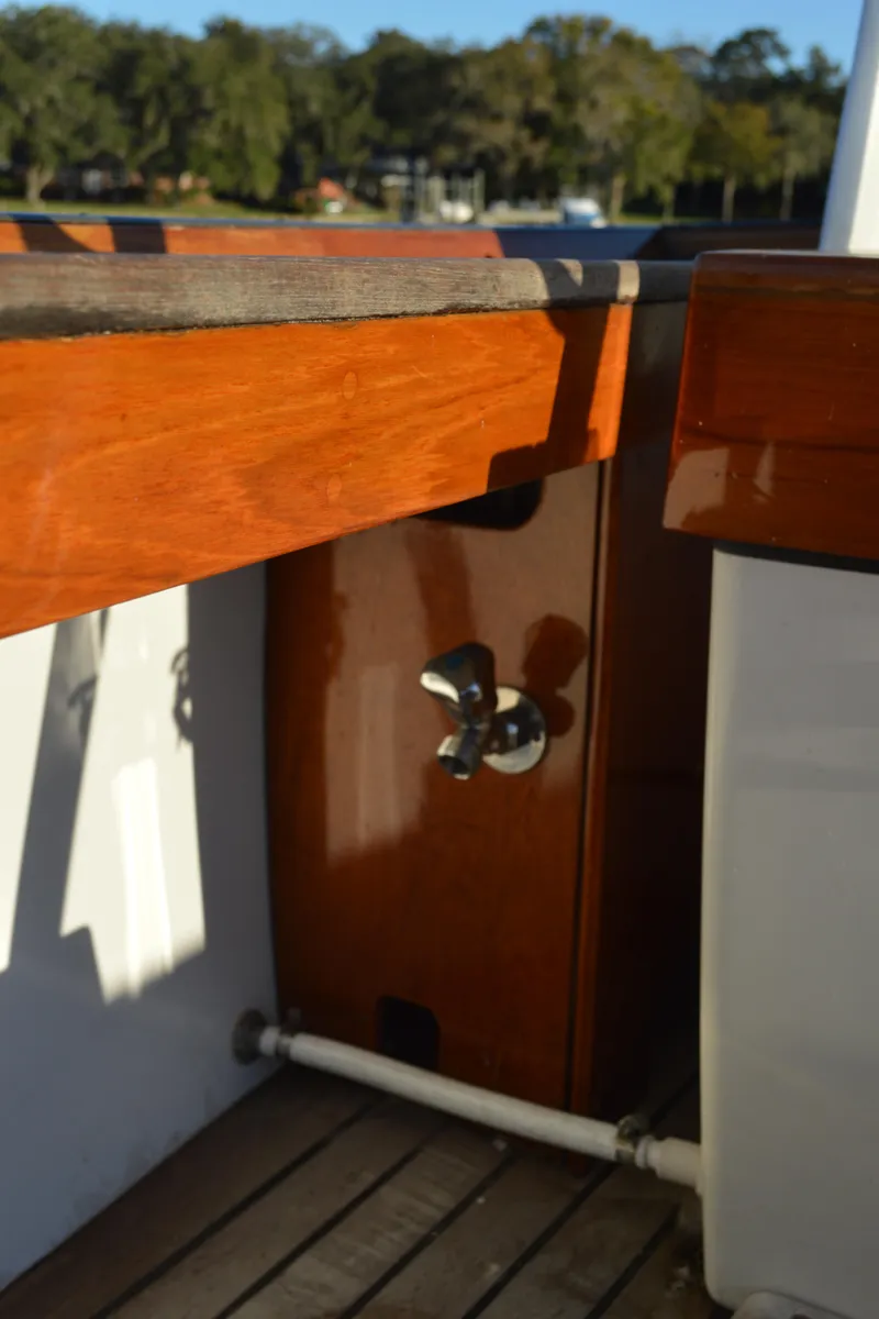 Slide: The Image of 1990 Stanley Downeast Lobster Boat with polished wood details and metal fixtures. - 19