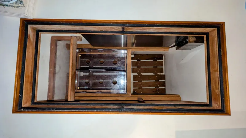 Slide: The Image of Wooden interior of a 1990 Stanley Downeast Lobster Boat, showcasing craftsmanship and design. - 31