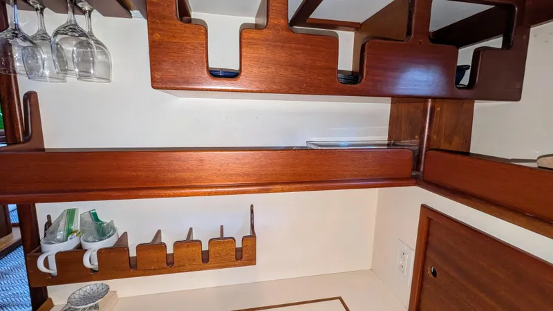 Slide: The Image of Wooden interior shelving in a 1990 Stanley Downeast Lobster Yacht. - 33