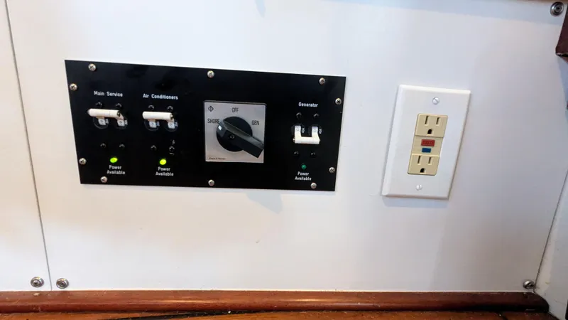 Slide: The Image of Control panel and outlet on a 1990 Stanley Downeast Lobster Boat. - 45