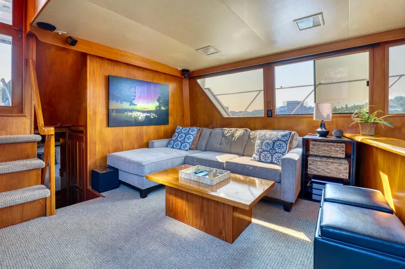 Slide: The Image of Luxurious 1987 Ocean Alexander Motoryacht interior with cozy seating and elegant decor. - 8