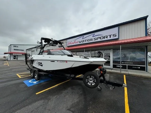 Slide: The Image of 2018 Axis A22 boat parked at Idaho Water Sports dealership. - 10