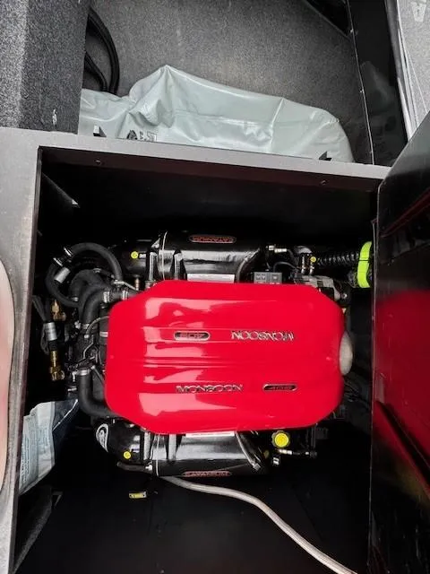 Slide: The Image of 2018 Axis A22 boat engine with red Monsoon cover, detailed view. - 21