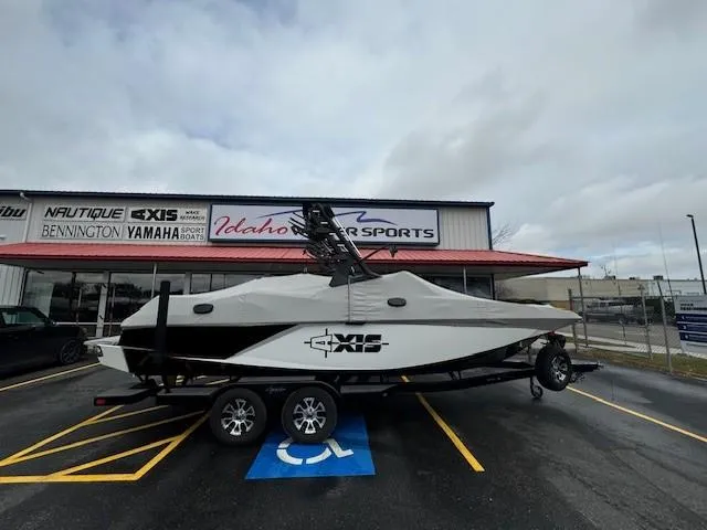 Slide: The Image of 2018 Axis A22 boat on trailer at Idaho Water Sports dealership. - 3