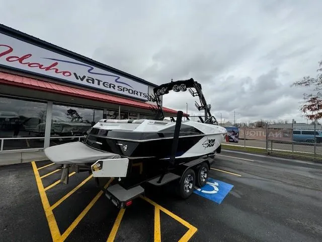 Slide: The Image of 2018 Axis A22 boat parked at Idaho Water Sports dealership. - 4