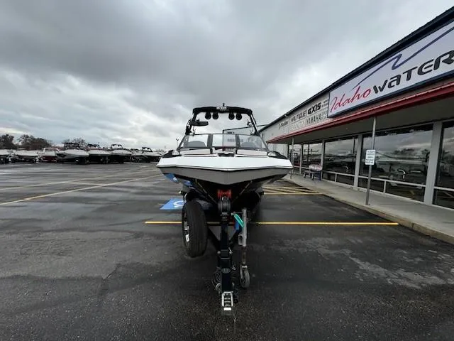 Slide: The Image of 2018 Axis A22 boat on trailer at Idaho Water Sports dealership. - 9