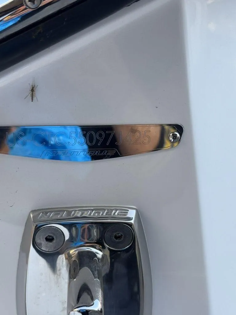Slide: The Image of 2025 Nautique Super Air Nautique G25 hull identification plate and hardware. - 26