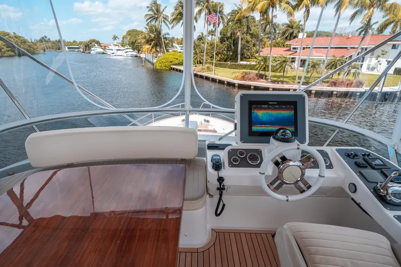 Slide: The Image of Cockpit view of 2018 Azimut Magellano 53 yacht with navigation system. - 11