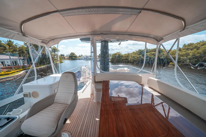 Slide: The Image of Luxurious 2018 Azimut Magellano 53 yacht interior with scenic waterway view. - 14