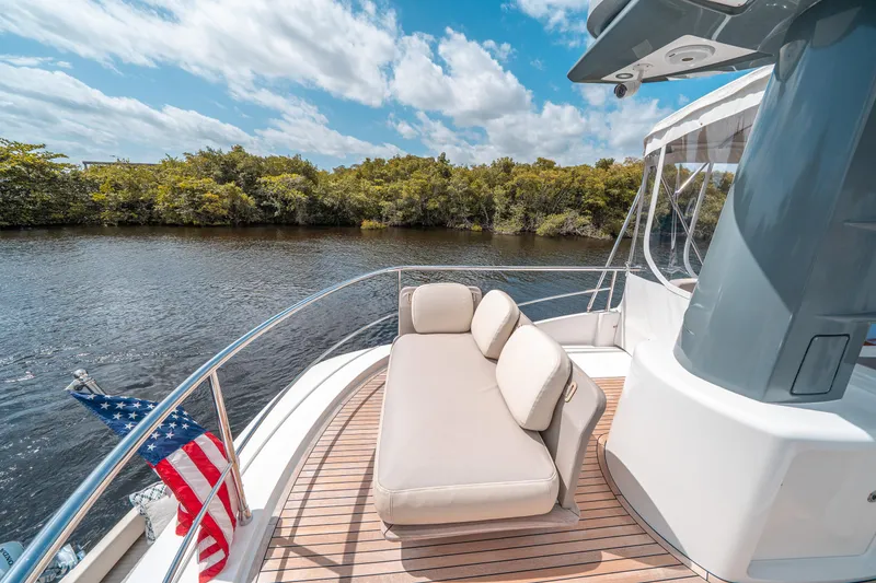Slide: The Image of Azimut Magellano 53 yacht deck with seating, 2018 model, cruising on a sunny day. - 16
