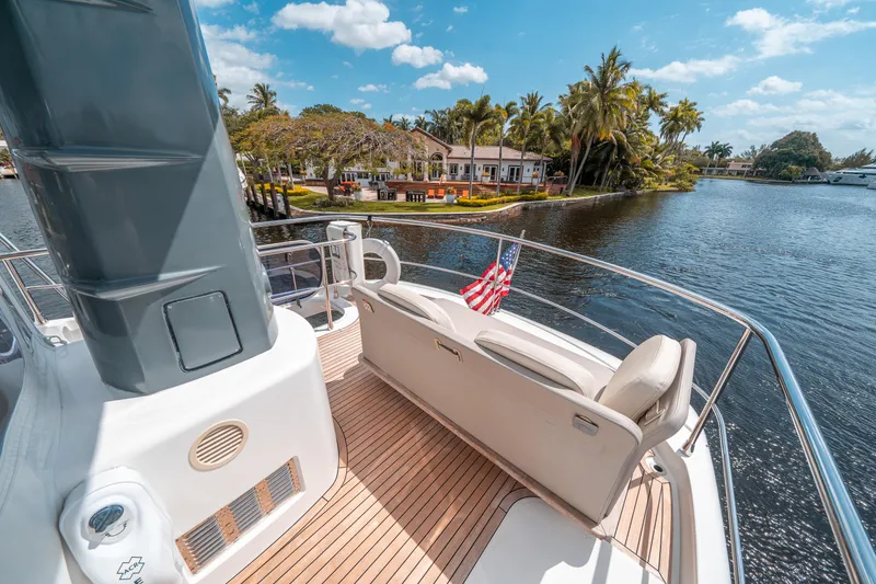 Slide: The Image of Azimut Magellano 53 yacht deck with scenic waterfront view, 2018 model. - 20