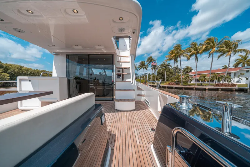 Slide: The Image of Luxurious 2018 Azimut Magellano 53 yacht deck with tropical waterfront view. - 35
