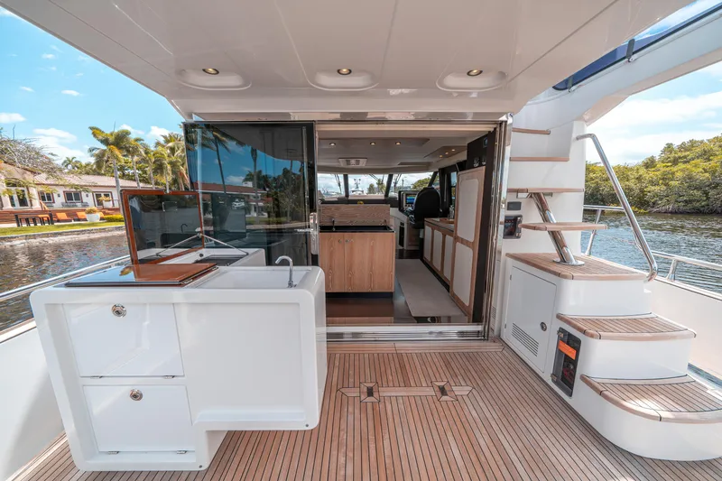 Slide: The Image of Azimut Magellano 53 yacht interior, 2018 model, featuring modern design and spacious deck area. - 40