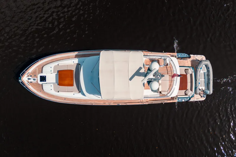 Slide: The Image of Aerial view of 2018 Azimut Magellano 53 yacht cruising on dark water. - 8