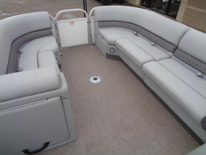 Slide: The Image of 2023 Ranger Reata 220C boat interior with spacious seating and modern design. - 8