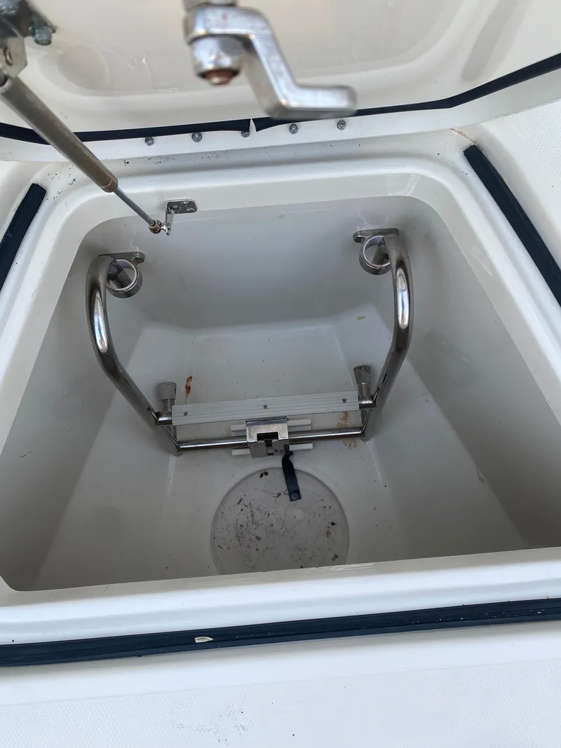 Slide: The Image of 2017 Hydra-Sports 3400 Center Console storage compartment with stainless steel fittings. - 15