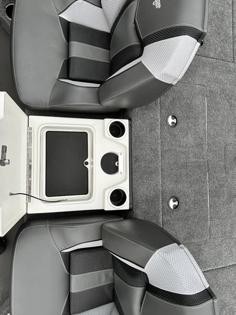 Slide: The Image of 2025 Ranger ALPHA 208 interior with gray seats and center console. - 10