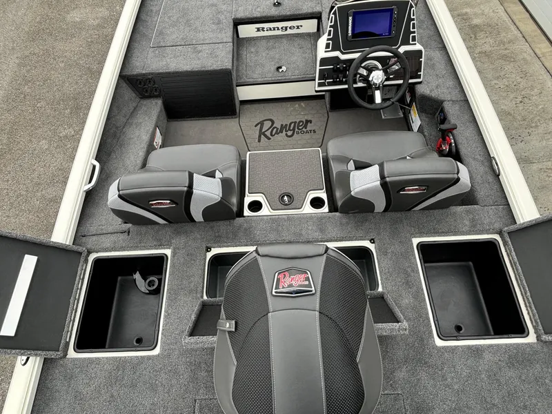 Slide: The Image of Interior of 2025 Ranger ALPHA 208 boat with seating and storage compartments. - 15