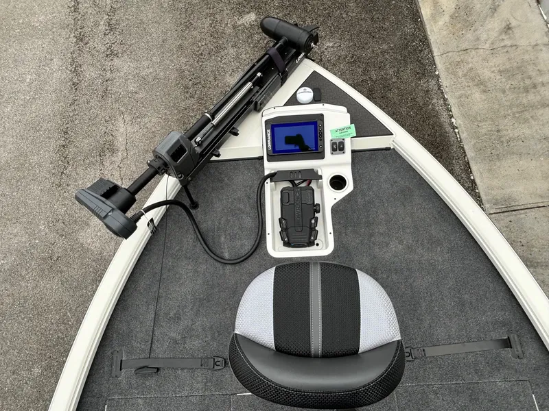 Slide: The Image of Ranger ALPHA 208 boat interior with navigation system and seating, 2025 model. - 2