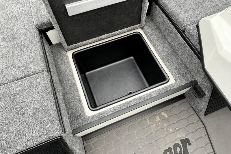 Slide: The Image of Ranger ALPHA 208 boat storage compartment, 2025 model, with textured flooring. - 7