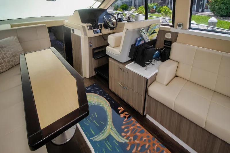 Slide: The Image of Luxurious interior of 2020 Regal 38 XO yacht with modern seating and decor. - 22