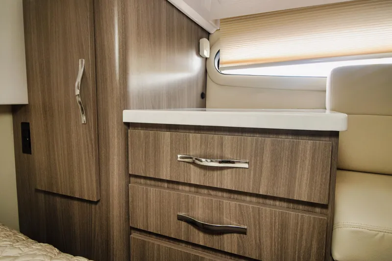 Slide: The Image of Interior of 2020 Regal 38 XO yacht with modern wood cabinetry and sleek design. - 33