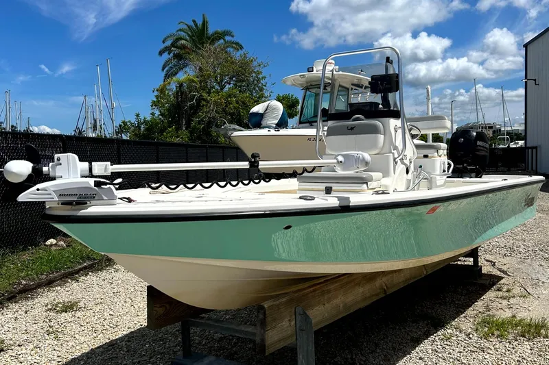 Slide: The Image of 2018 Mako 21LTS boat on display outdoors, sunny day. - 1