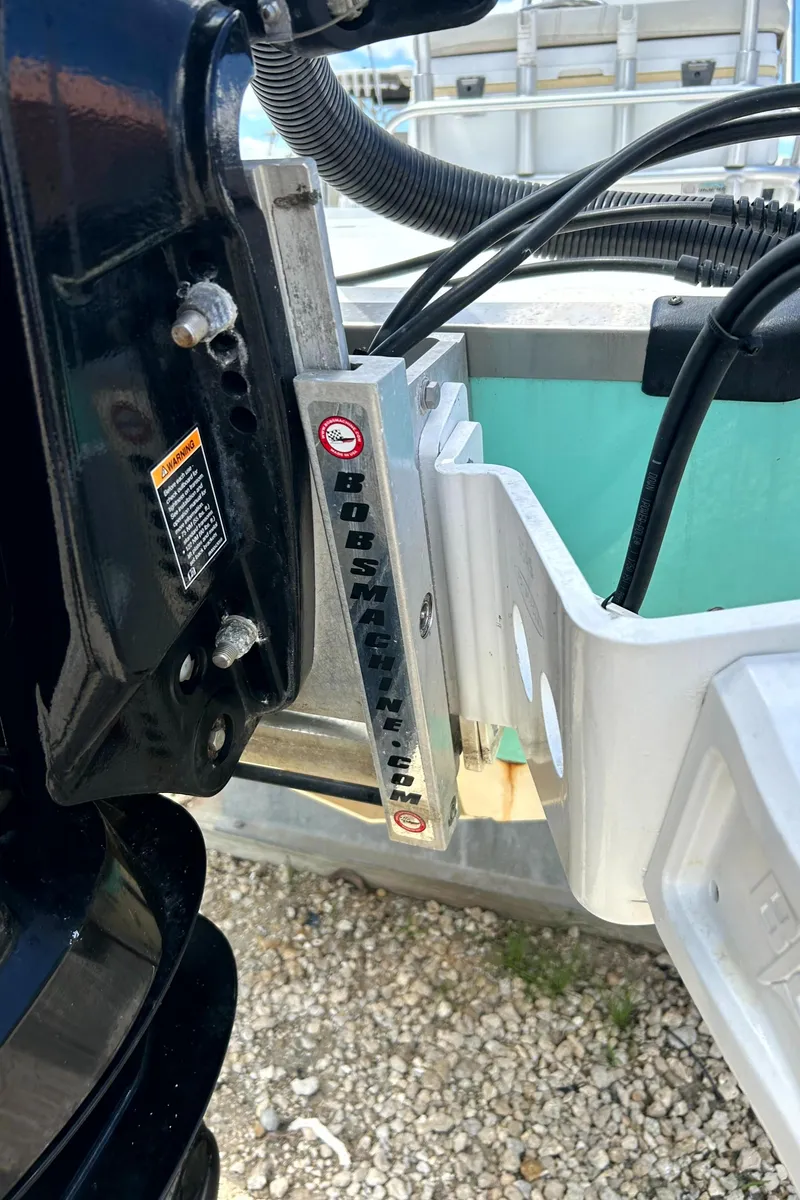 Slide: The Image of Close-up of a 2018 Mako 21LTS boat engine mount and wiring. - 17