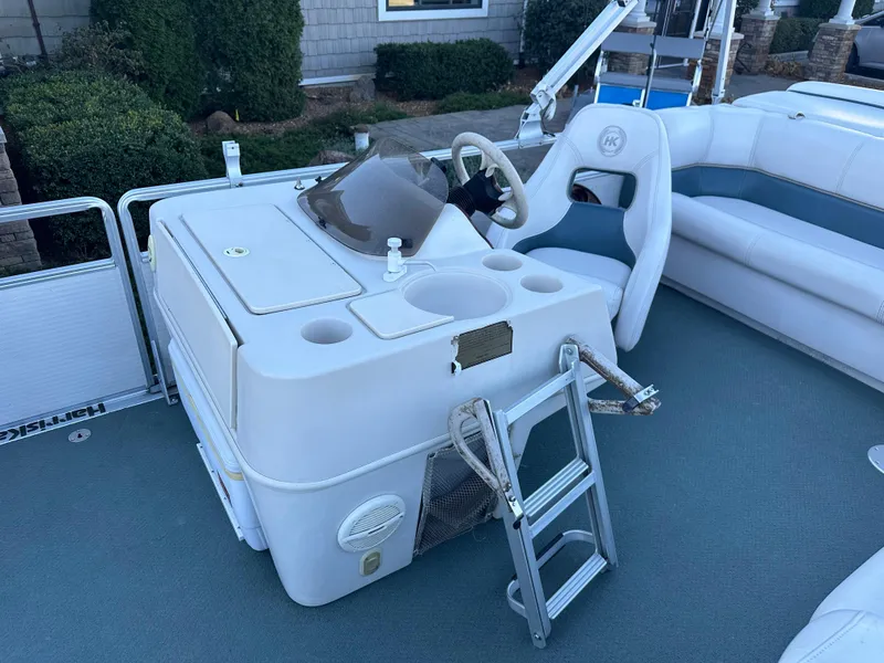 Slide: The Image of Harris EURO CLASSIC 2000 boat interior with steering console and seating area. - 10