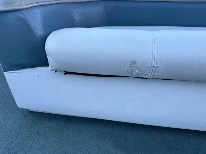 Slide: The Image of Worn Harris EURO CLASSIC 2000 boat seat with visible tear and damage. - 6