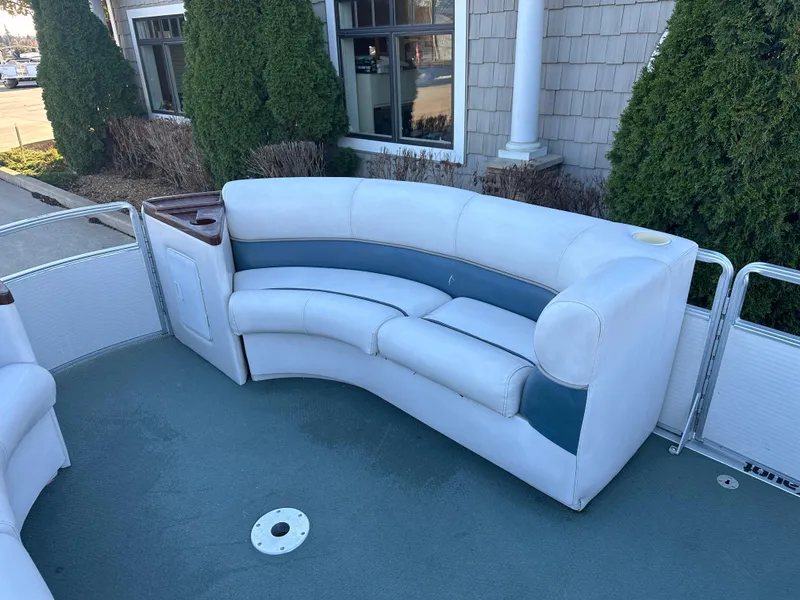 Slide: The Image of Harris EURO CLASSIC 2000 boat seating with white and blue upholstery, outdoor setting. - 7