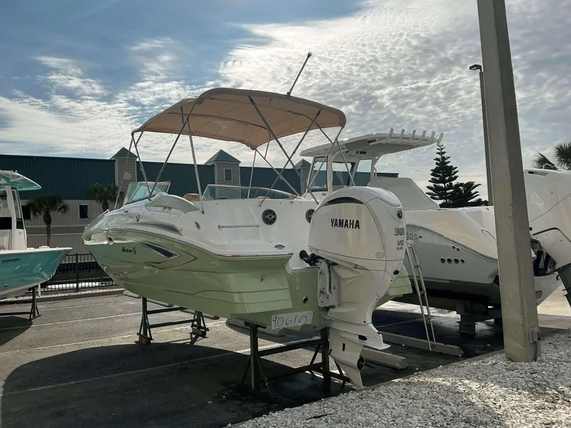 Slide: The Image of 2025 Hurricane 2400 SD boat with Yamaha engine on display. - 11