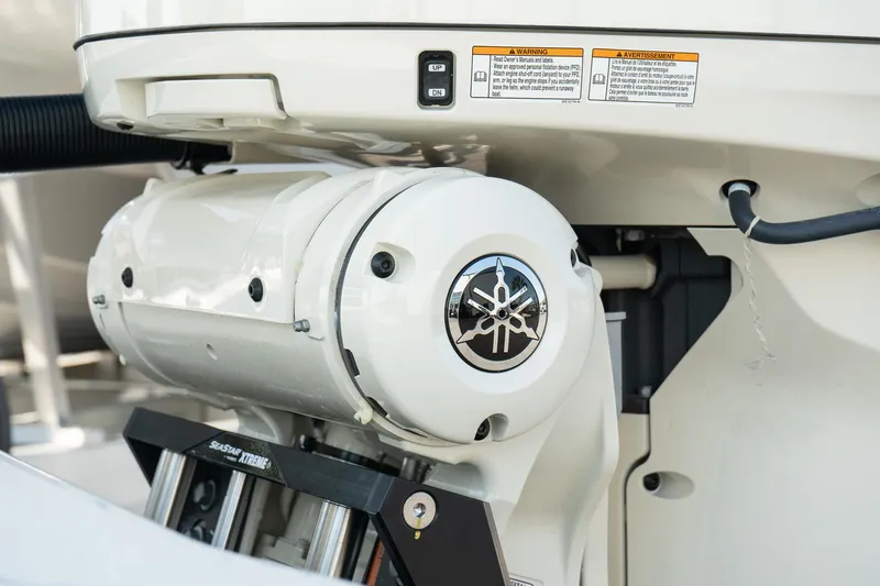 Slide: The Image of Close-up of 2025 Scout 261 XSS boat engine detail. - 10
